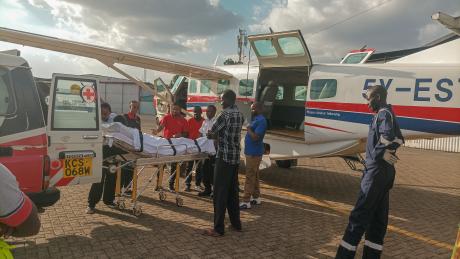 The E plus Ambulance Services' team at Wilson Airport getting patients ready for transfer to Tenwek Hospital.